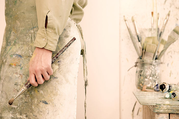 Artist Holding a Paintbrush_edited.jpg