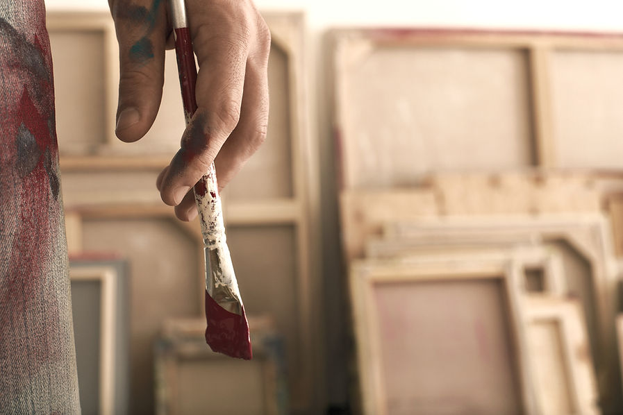 Holding a Paintbrush_edited.jpg