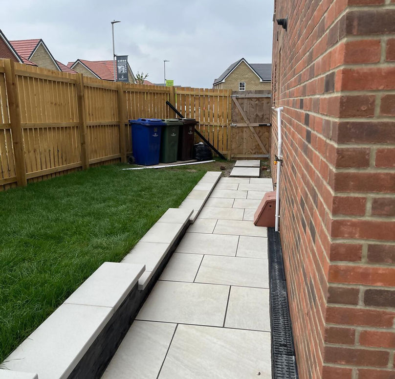 alley down side of house with new patio