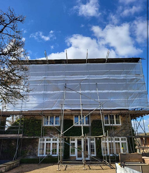 temporary roof scaffolding over house