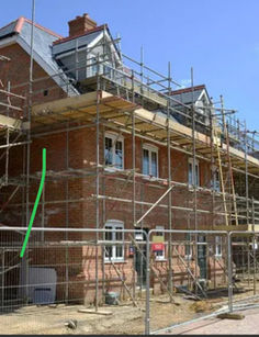 scaffold on row of new houses