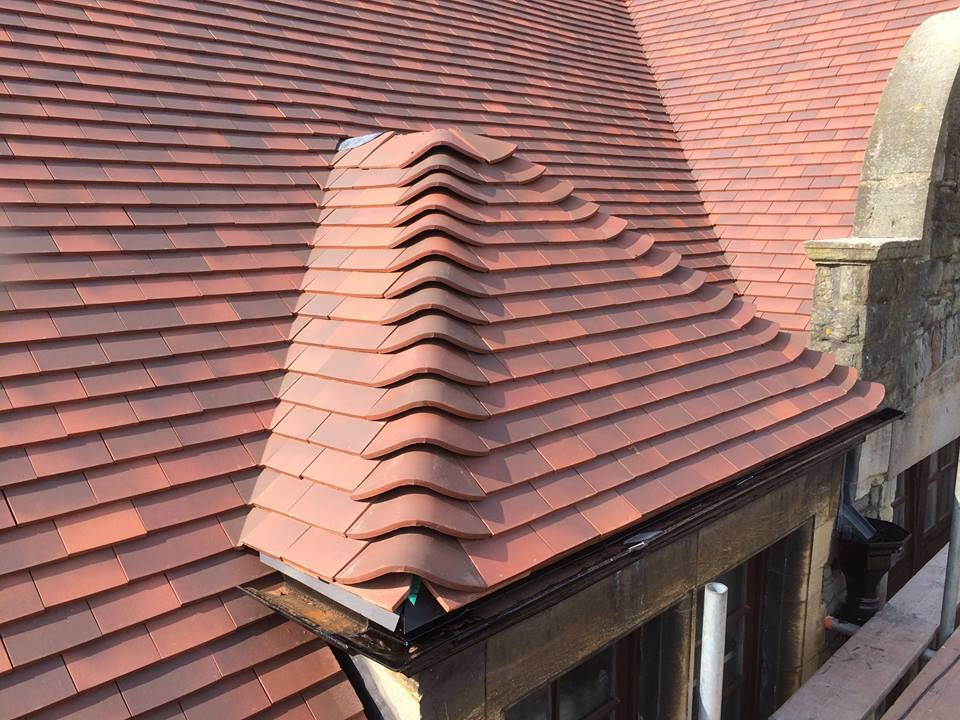 Red tiled roof with wavy pattern