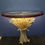 Thumbnail: Unique table with a glass top and decorative wheat base against blue background