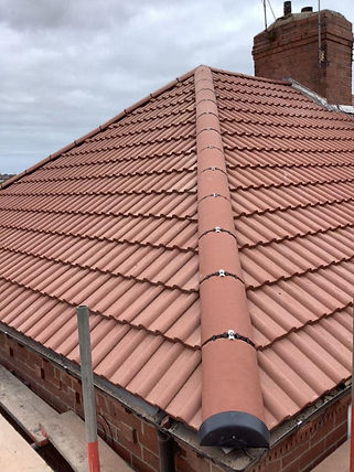 Newly installed red roof tiles