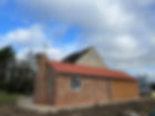 extension with brick and wood cladding