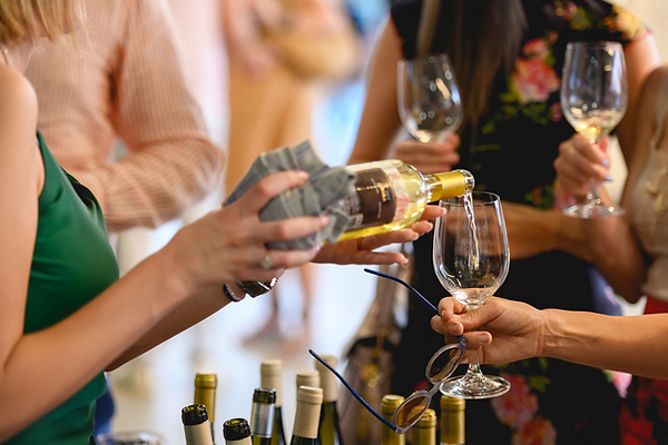 Guests enjoying private party at Grape & Grain bar in Cody Wyoming