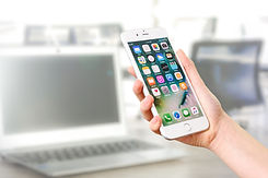woman-holding-a-smartphone-3168797_1920.jpg