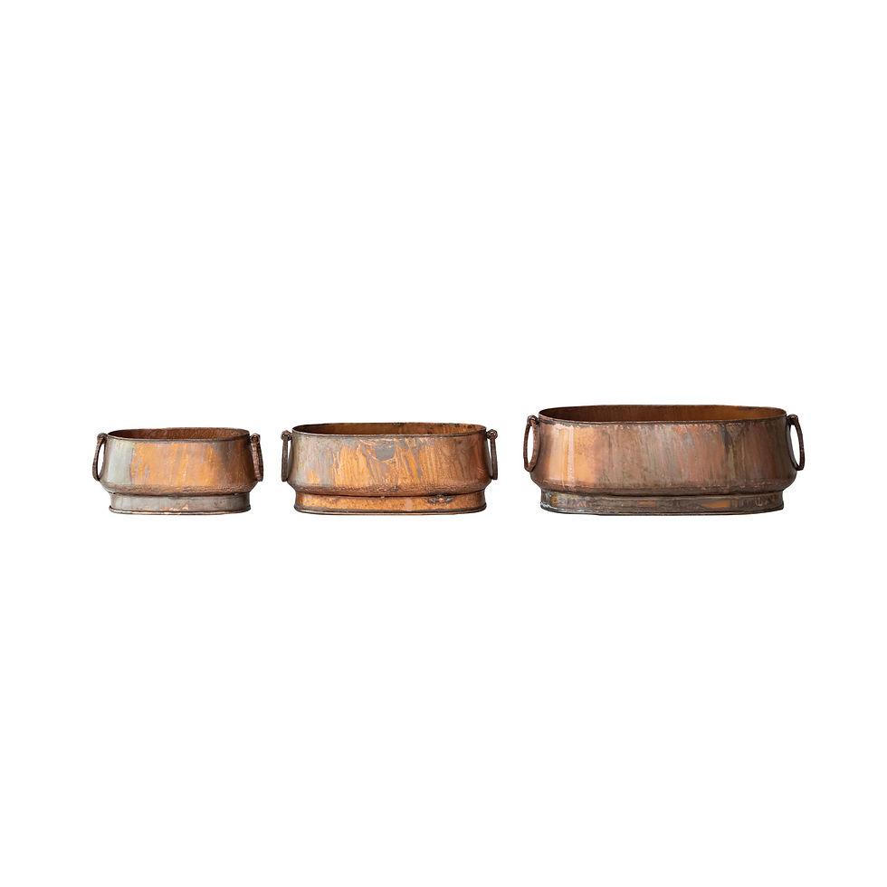 Three weathered copper-finished metal pots of varying sizes shown in a row, highlighting their industrial stepped-base design