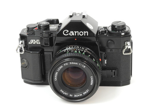 Canon A-1 SLR film camera with 50mm 1.8 lens + Color Film