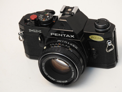 Black Pentax MX S.L.R 35mm film camera + 50mm f 2.0 lens+ New