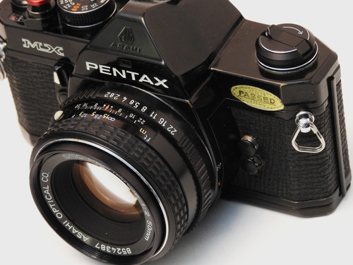 Black Pentax MX S.L.R 35mm film camera + 50mm f 2.0 lens+ New
