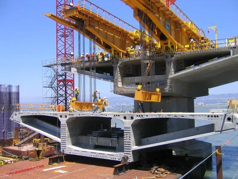 Joe Blum, Ironworkers Hooking
Up Strand Jacks to Lift
First Skyway Deck
Section from Barge, 2004 