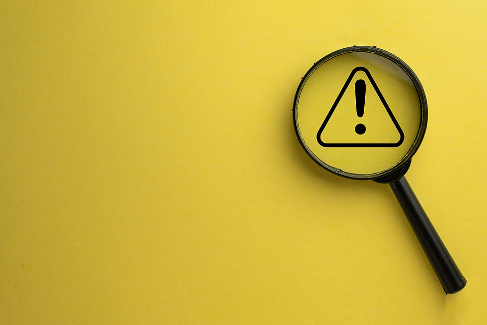 Attention sign,Exclamation mark,warning sign concept.,Magnifying glass focus on Hazard war