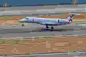 JSX's new livery retains the red stripe and adds the new logo.