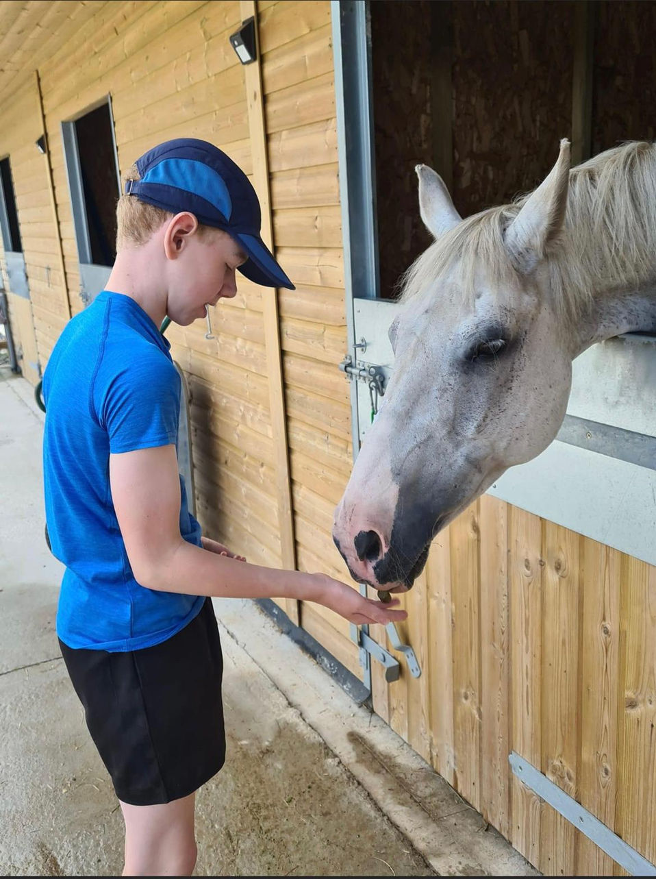 Des helper Amanda Roberts and son Harry.jpg