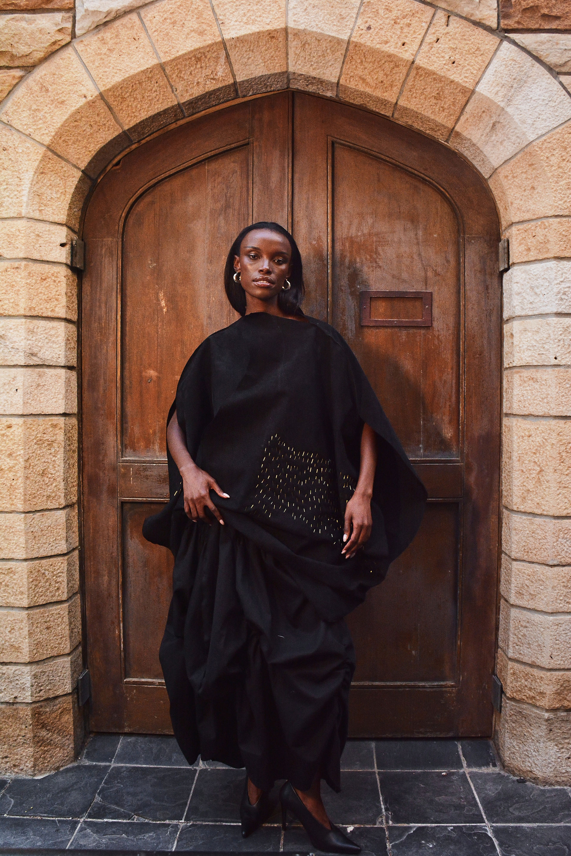 model posing infront of cathedral doors