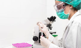 scientist-filling-test-tube-with-pipette-laboratory-scaled-e1634099422138.jpg