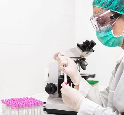 scientist-filling-test-tube-with-pipette-laboratory-scaled-e1634099422138.jpg