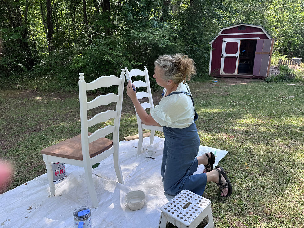 woman painting chair