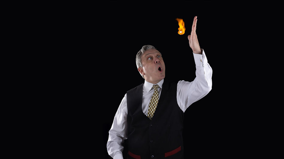 Member of The Magic Circle, Brian Storey performs a stunning fire magic trick, captivating audiences at weddings, parties, and corporate events.
