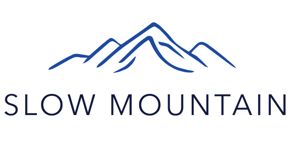 Slow Mountain GmbH logo representing mindful mountain experiences