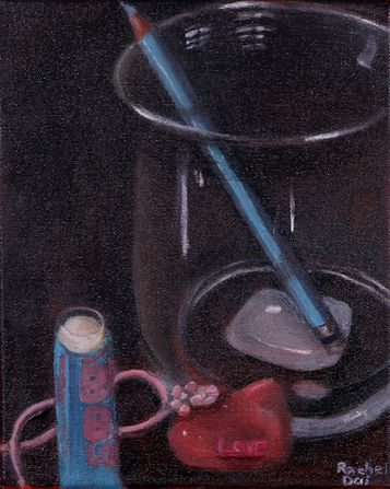 Still life of four objects. There's a glass container covering most of the painting, but set slightly to the top right. In the jar there is a light blue pencil. To the left, there is a blue stick of chapstick with pink text on it. In front of the glass is a hair tie with a large charm on it. The charm is pink and in the shape of a cat's head.