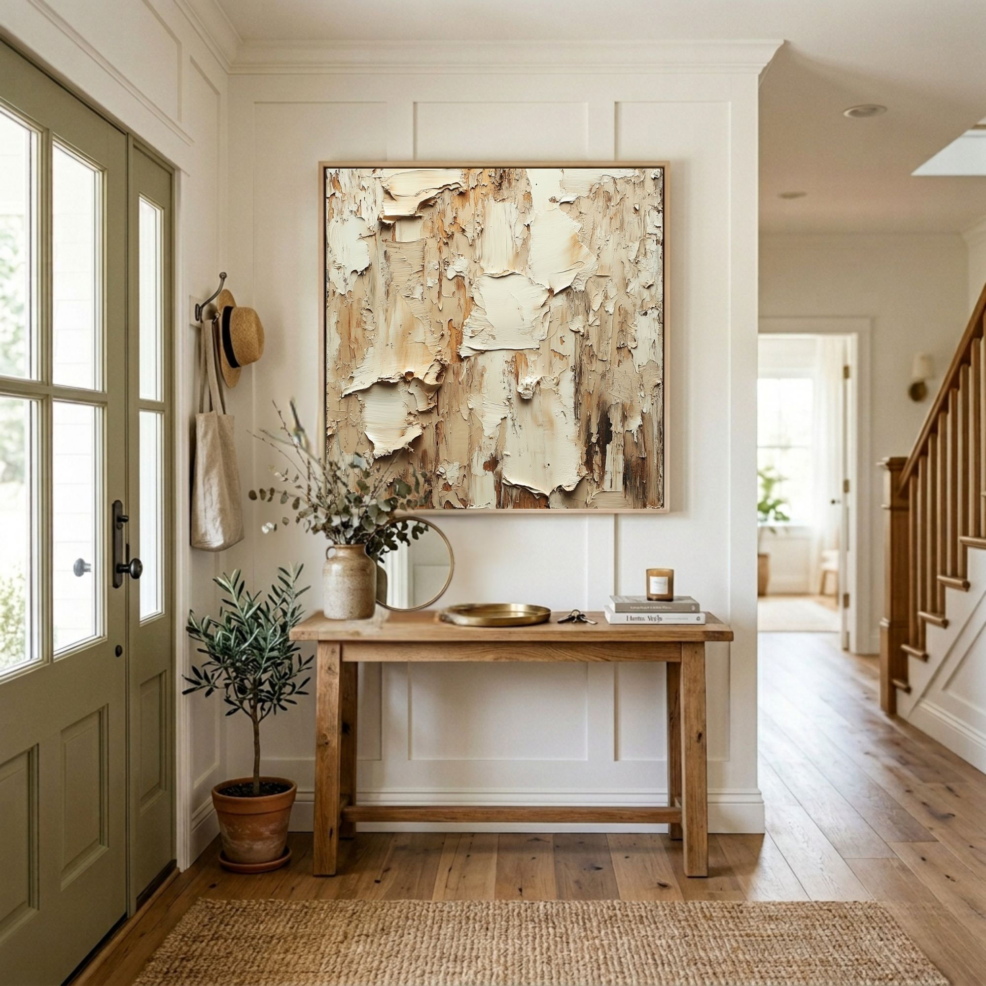 Textured abstract wall art in neutral tones for an entryway.