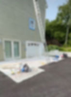 Exterior house painting by Dirigo Paint Co. on a multi-story home