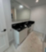 Bathroom vanity and wall painting by Dirigo Paint Co.
