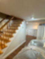 Freshly painted staircase and hallway by Dirigo Paint Co.