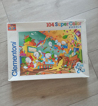 Puzzle 104 pièces (103 - 1 pièce perdue)