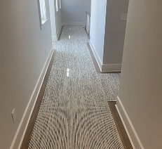Hand bound carpet on floor