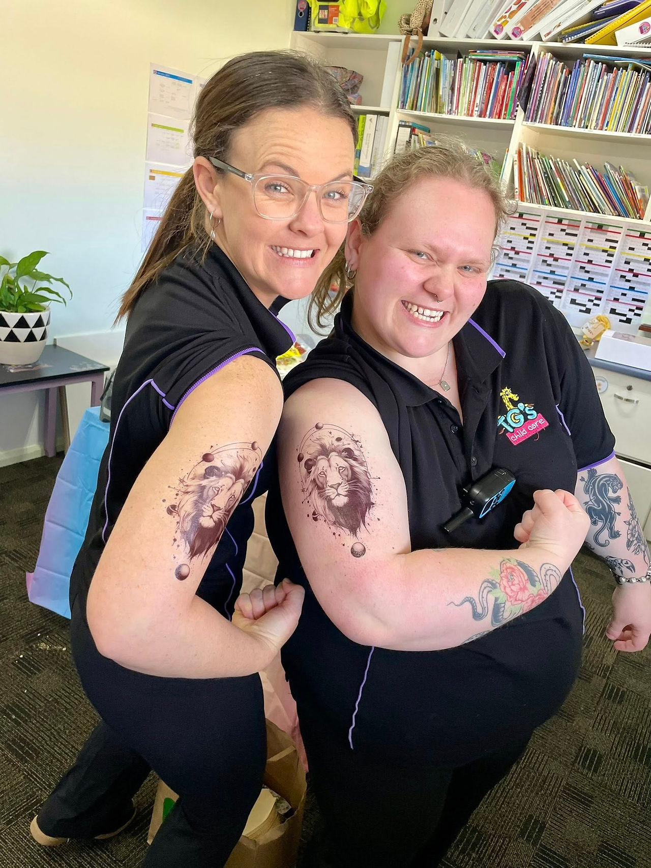 Nkala Frost and educator having fun | TG's Child Care