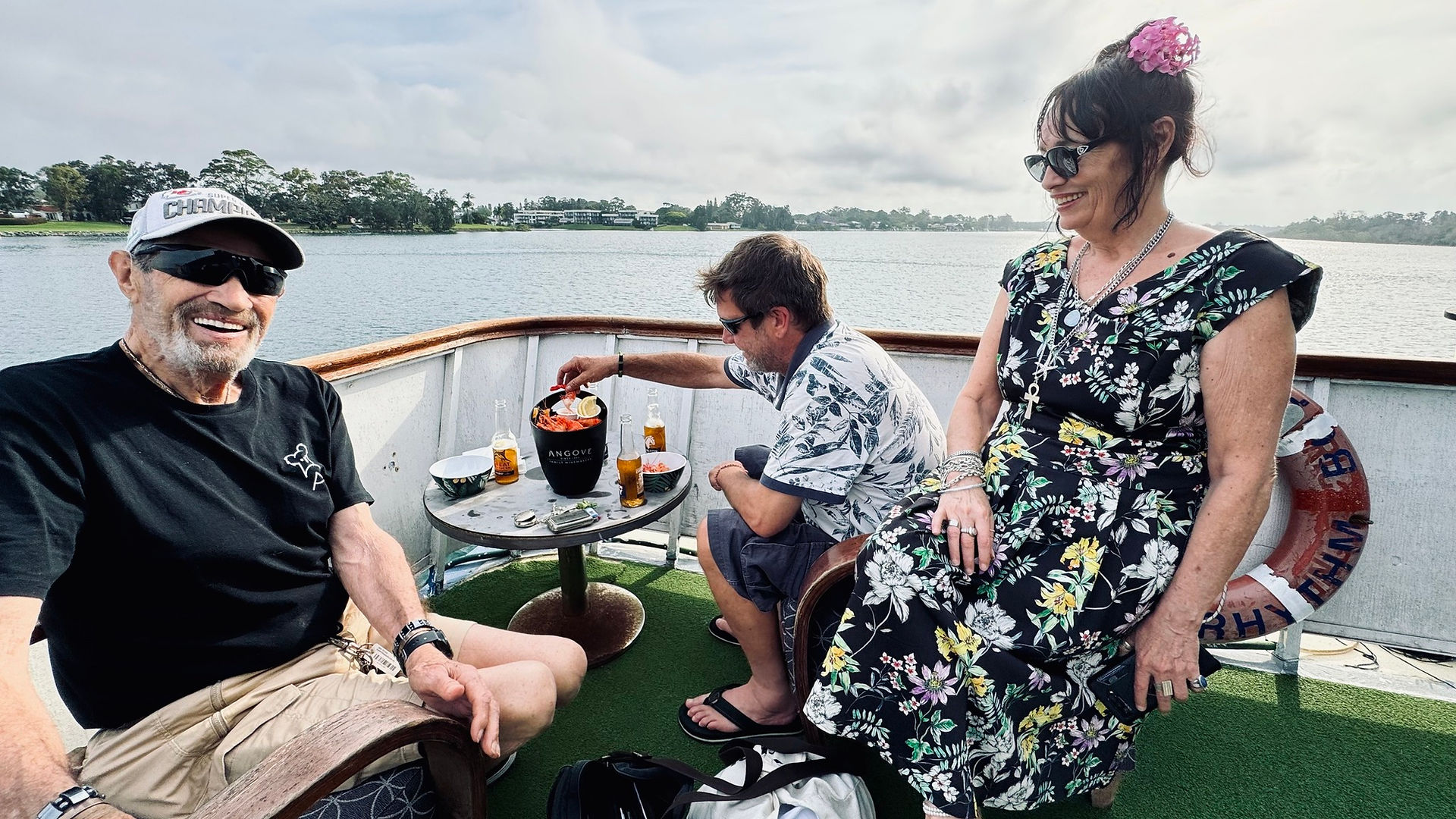 Tom Jones and Neil Diamond Cruise enjoying fresh prawns on deck | Port AdVenture Cruises