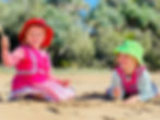 TG´s Urangan two children on the sand beach kindy.jpeg