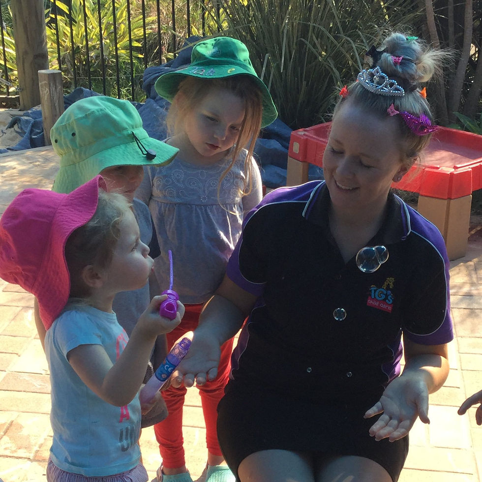 Laura Bull play time with children | TG's Child Care