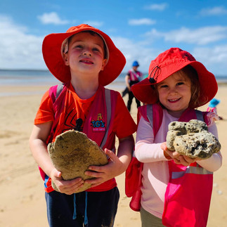 tg's urangan beach kindy two toddlers with corals