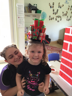 tg's high street toddler and educator having christmas fun | TG's Child Care | Brilliant-Online