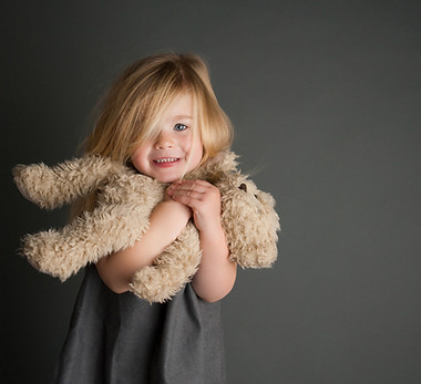 Child Hugging Teddy
