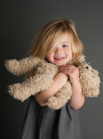 Girl and stuffed animal