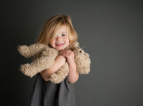 Girl and stuffed animal