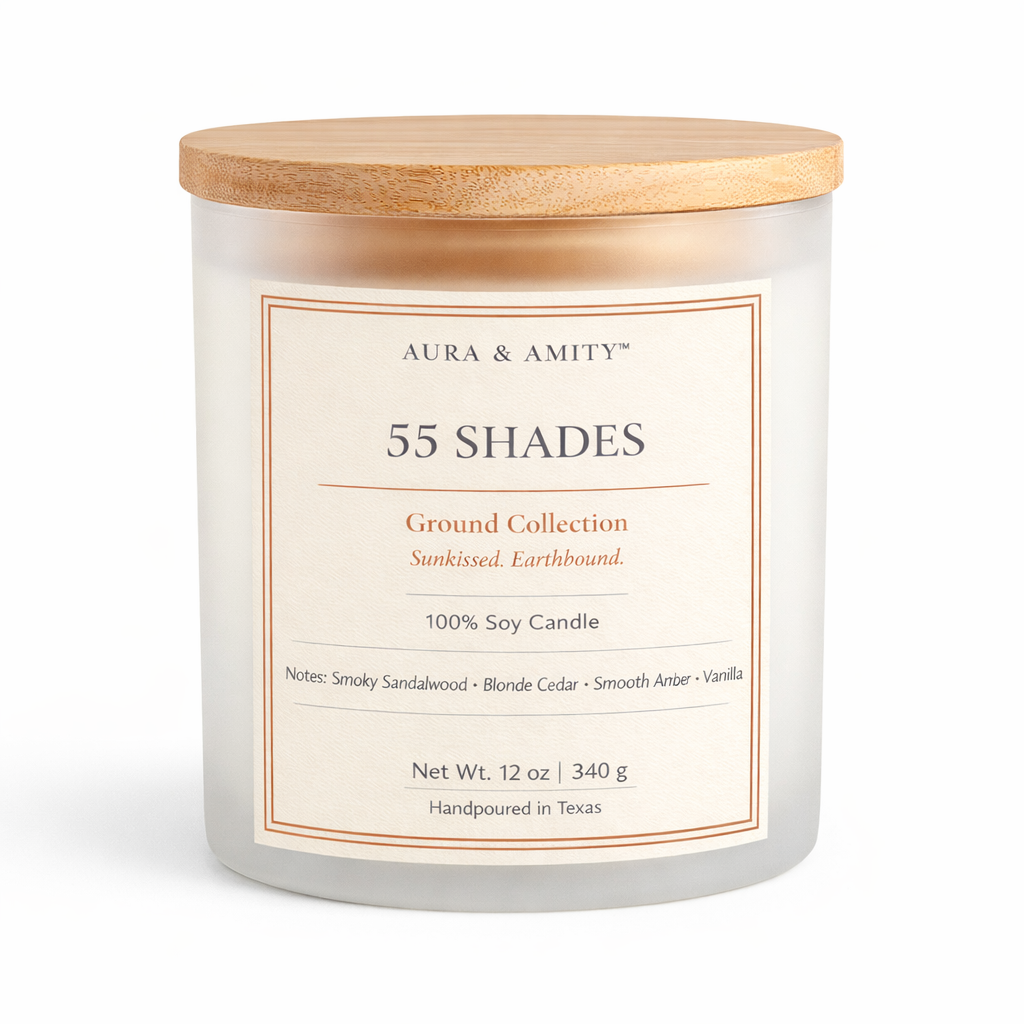 55 Shades hand-poured soy wax candle in a glass jar.