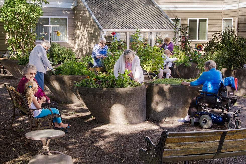 Residents enjoying the outdoors at a memory care assisted living facility