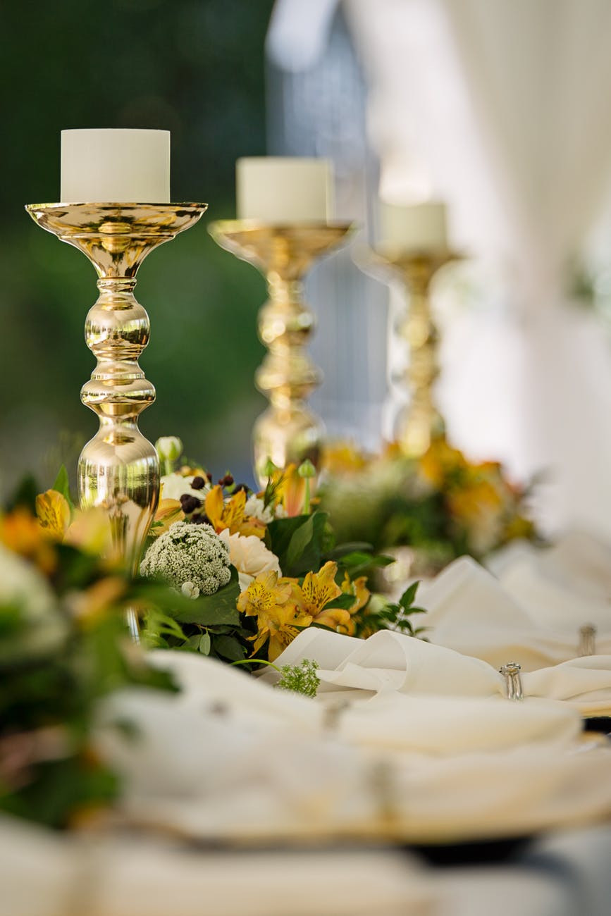 Gold Candlesticks with Votive Candles / Image courtesy of Pexels