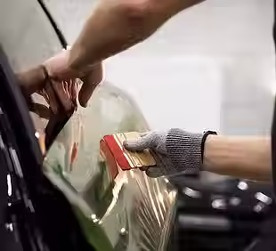 someone wrapping a car.avif