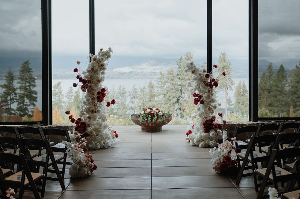 Thumbnail: Luxury faux floral broken arch in white, burgundy, and blush for Okanagan wedding ceremonies and aisle pillar rentals.