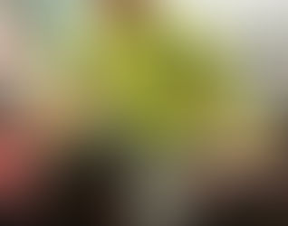 Man wearing high-vis jacket, sat down on machine