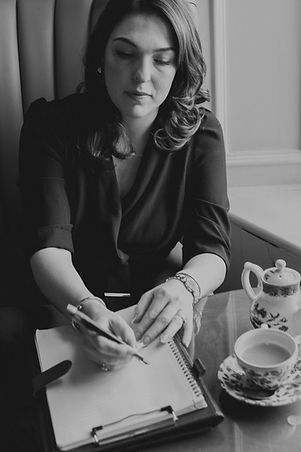 Jade Brady Career Coach, York, writing in a notebook