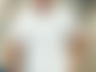 Man wearing white polo shirt