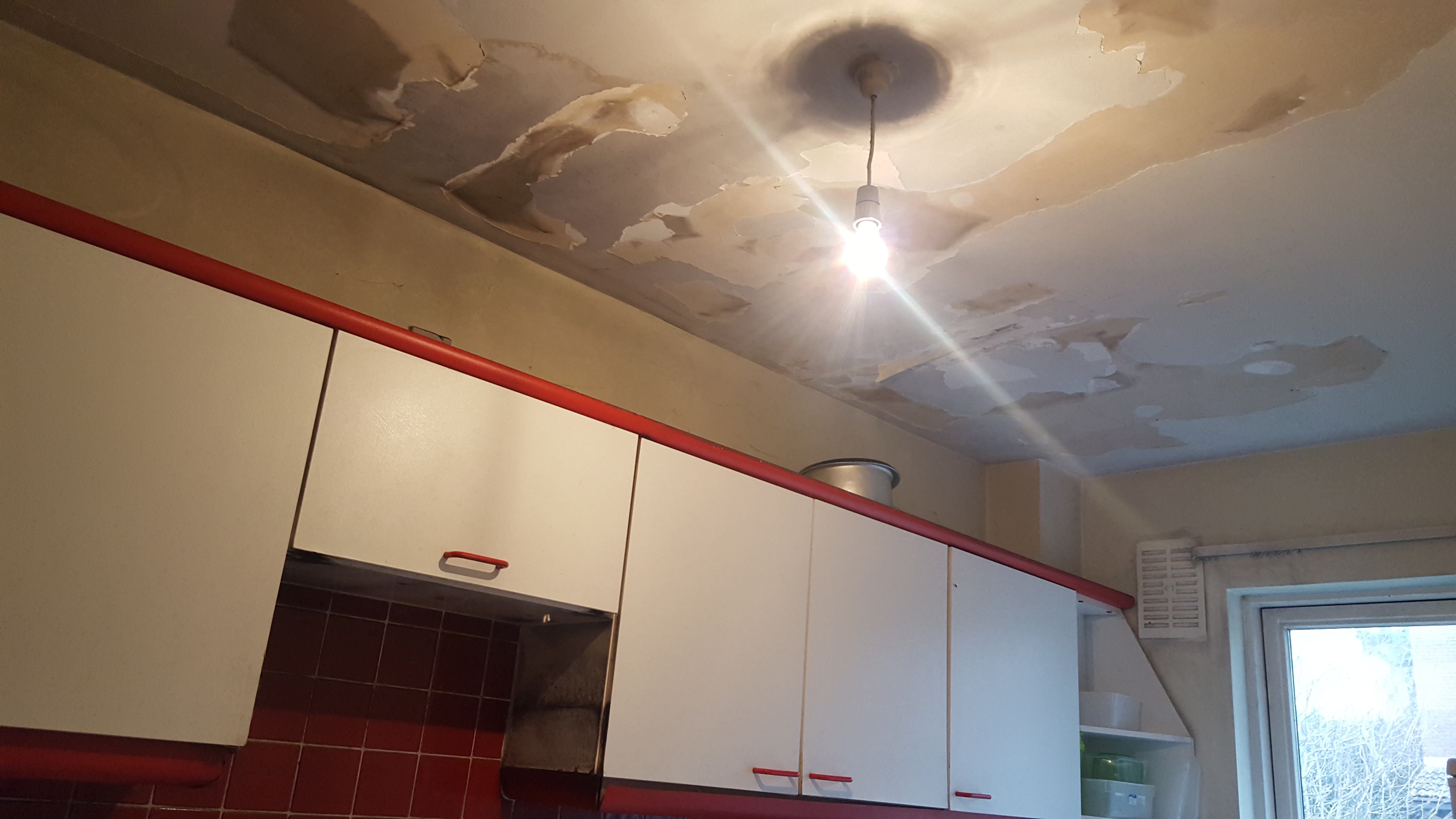 Property Repair Guys 365 fire damage to kitchen ceiling